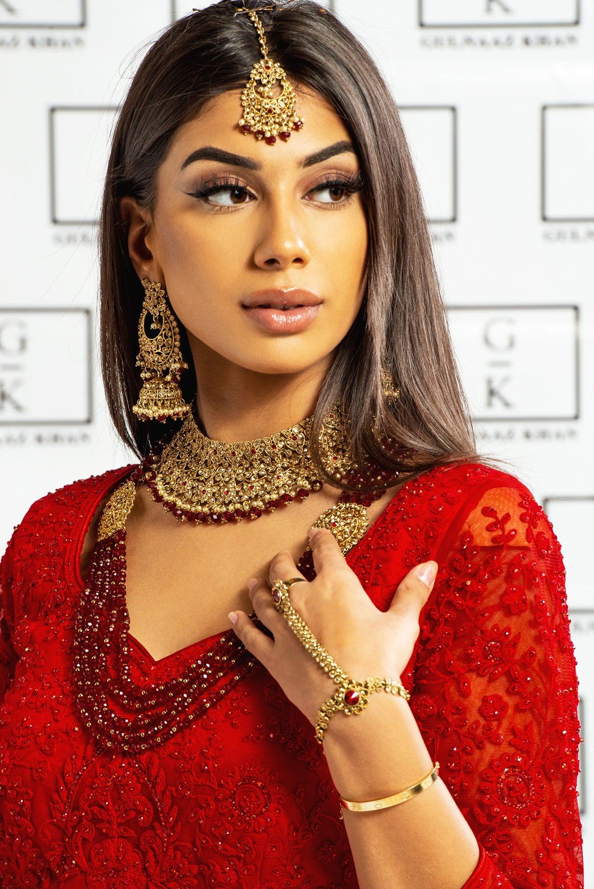 red stone golden necklace set
