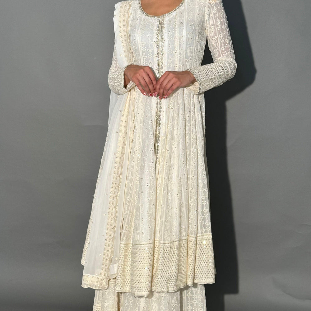 
                  
                    White designer kurti
                  
                