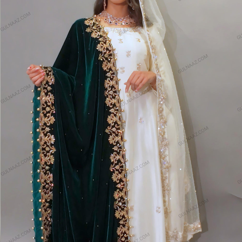 
                  
                    White gown with green dupatta
                  
                