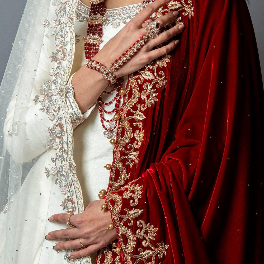 
                  
                    White lehenga with red dupatta
                  
                