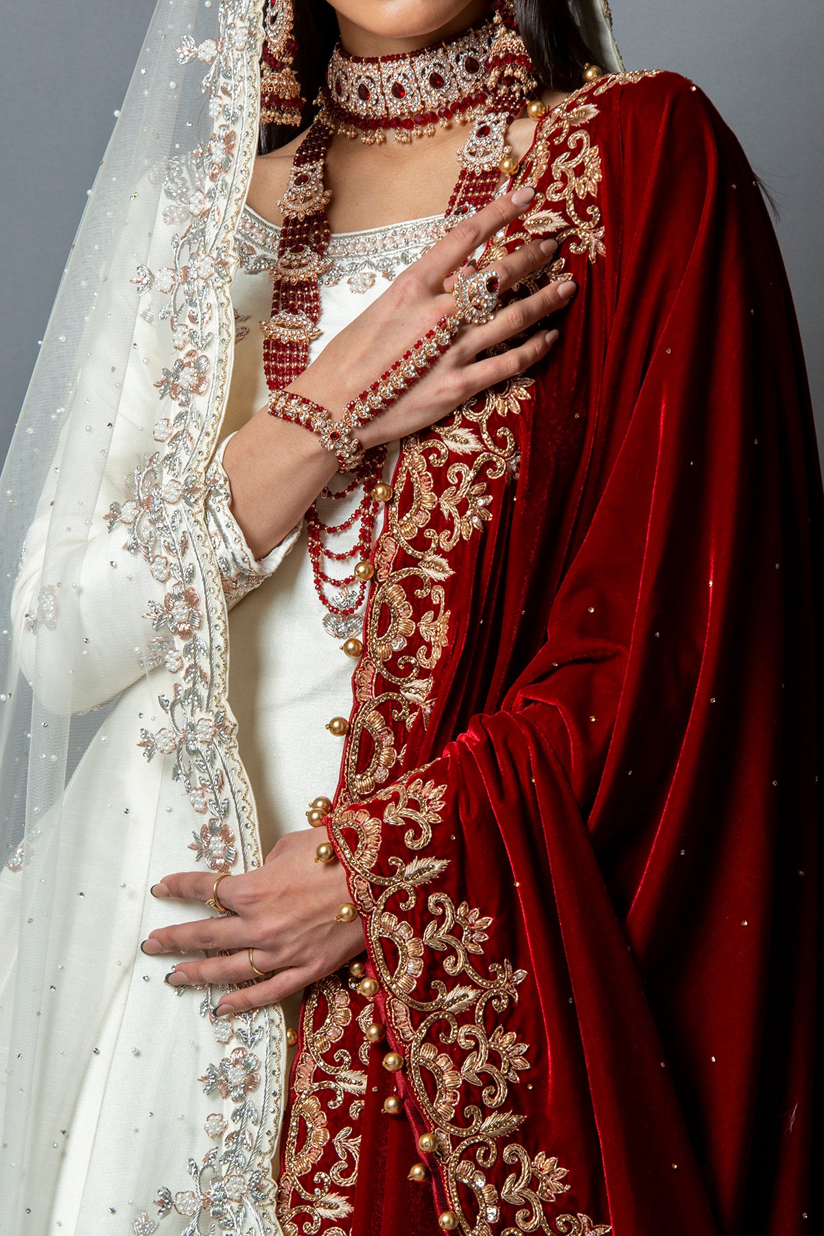 White lehenga with red dupatta