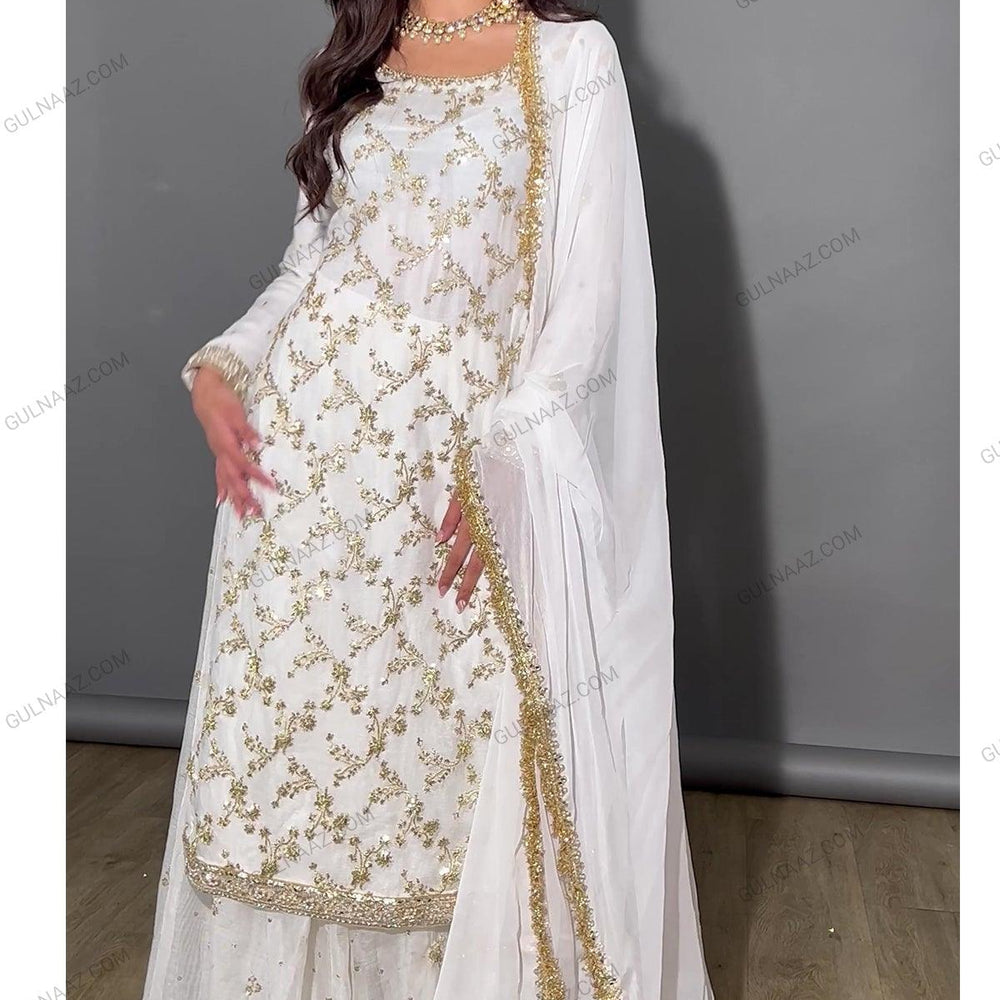 
                  
                    gold and white sharara set
                  
                