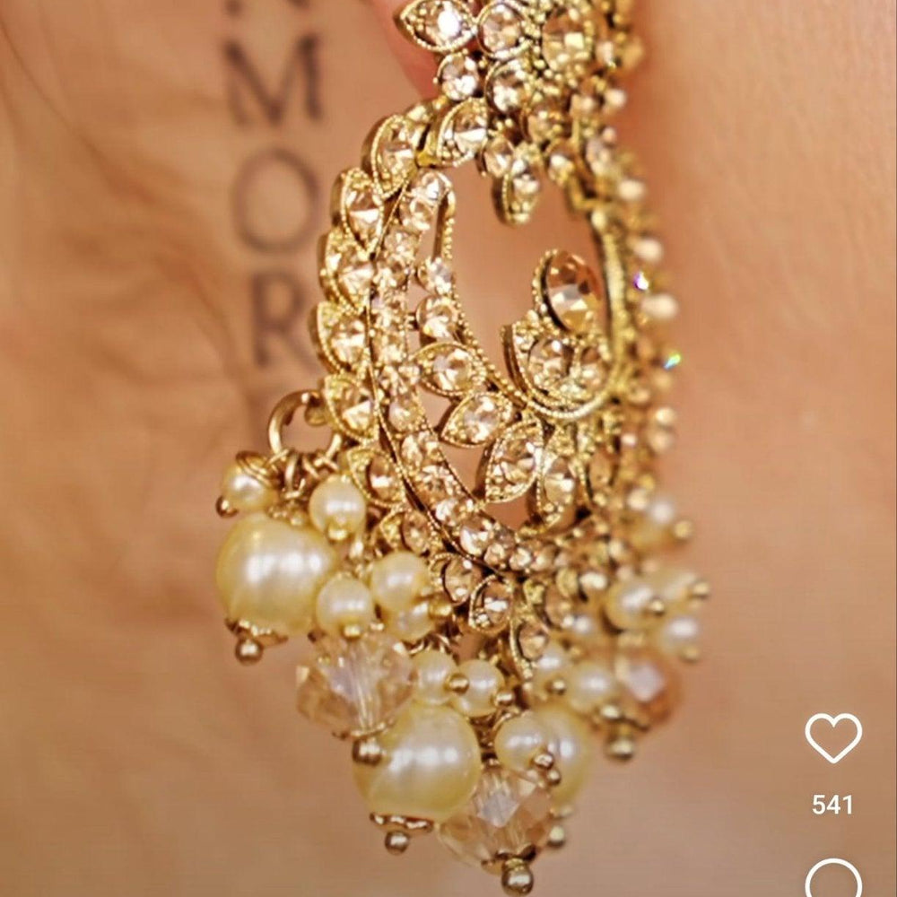 
                  
                    golden earrings
                  
                