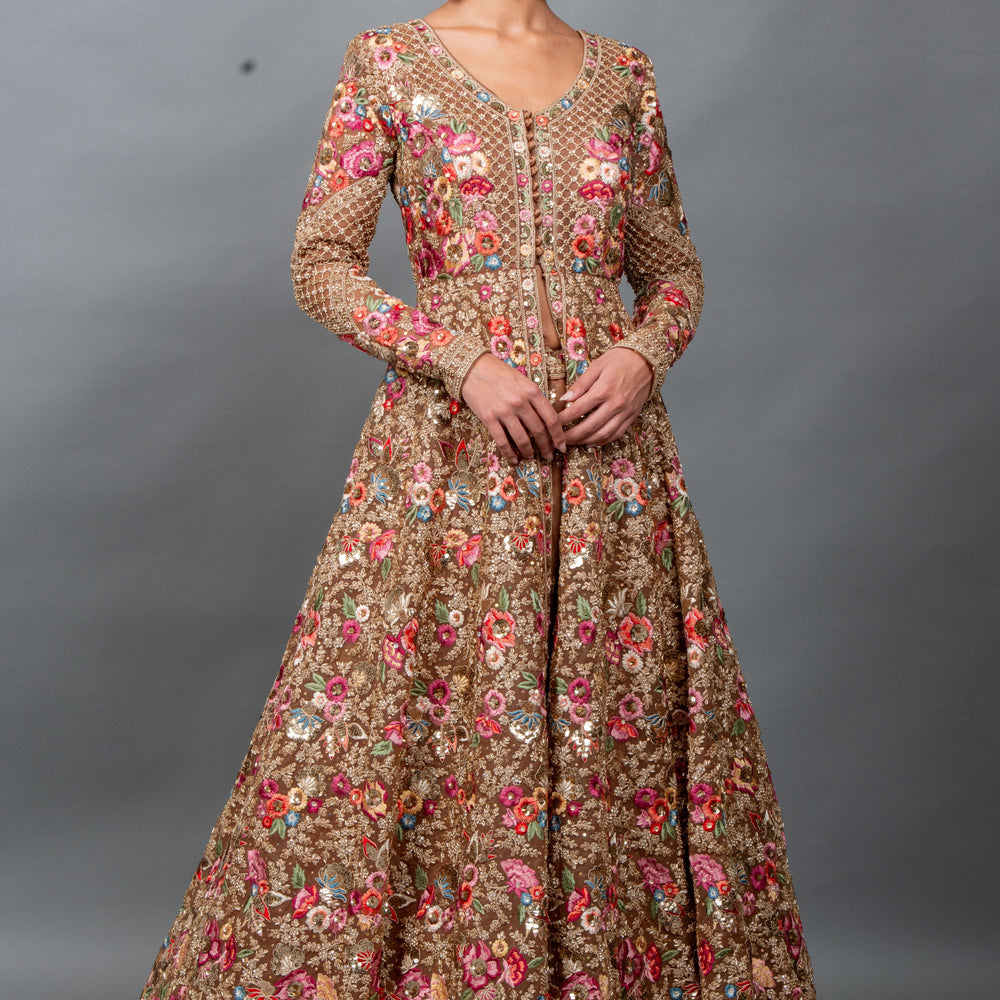 Shehwar bridal gown with full sleeves, V-neckline, and all-over floral embroidery