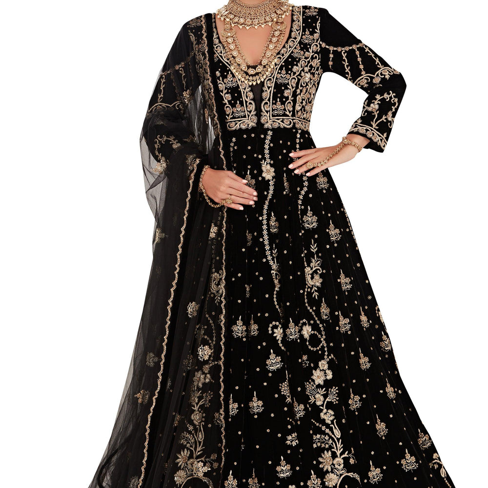 
                  
                    black gown with golden embroidery
                  
                