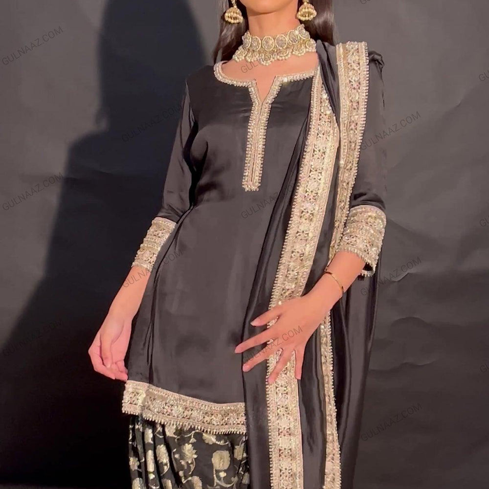 
                  
                    black salwar and kameez
                  
                