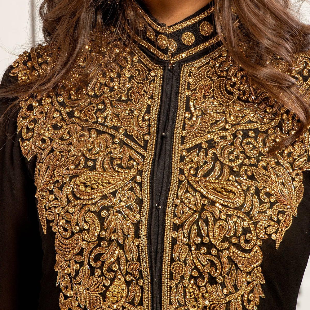 
                  
                    black gold dress
                  
                