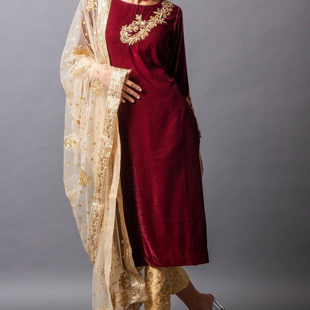 
                  
                    red kurta and golden pant
                  
                