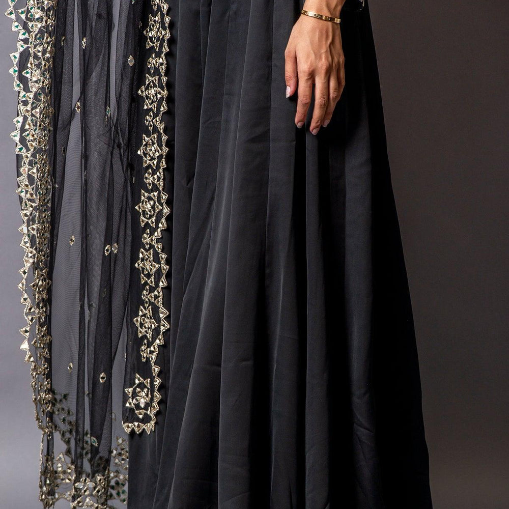 
                  
                    long black gown
                  
                