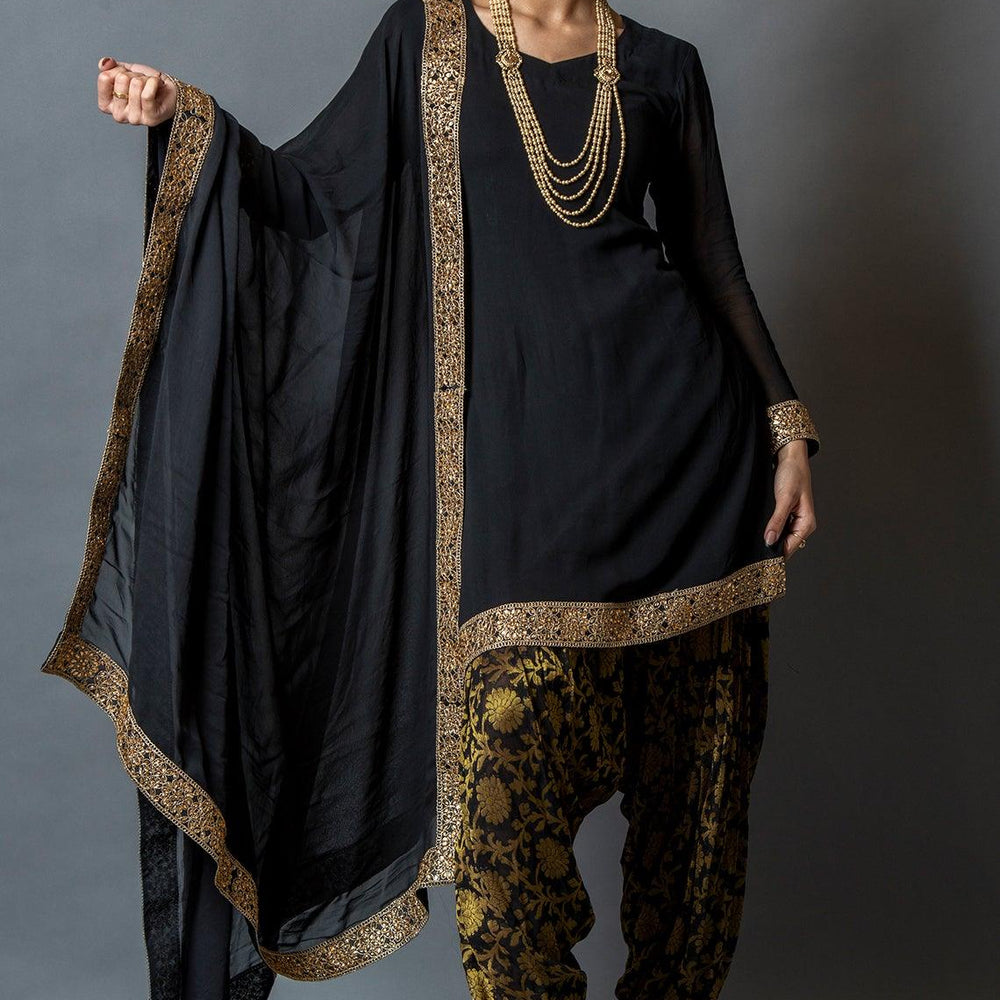 
                  
                    black and gold salwar kameez
                  
                
