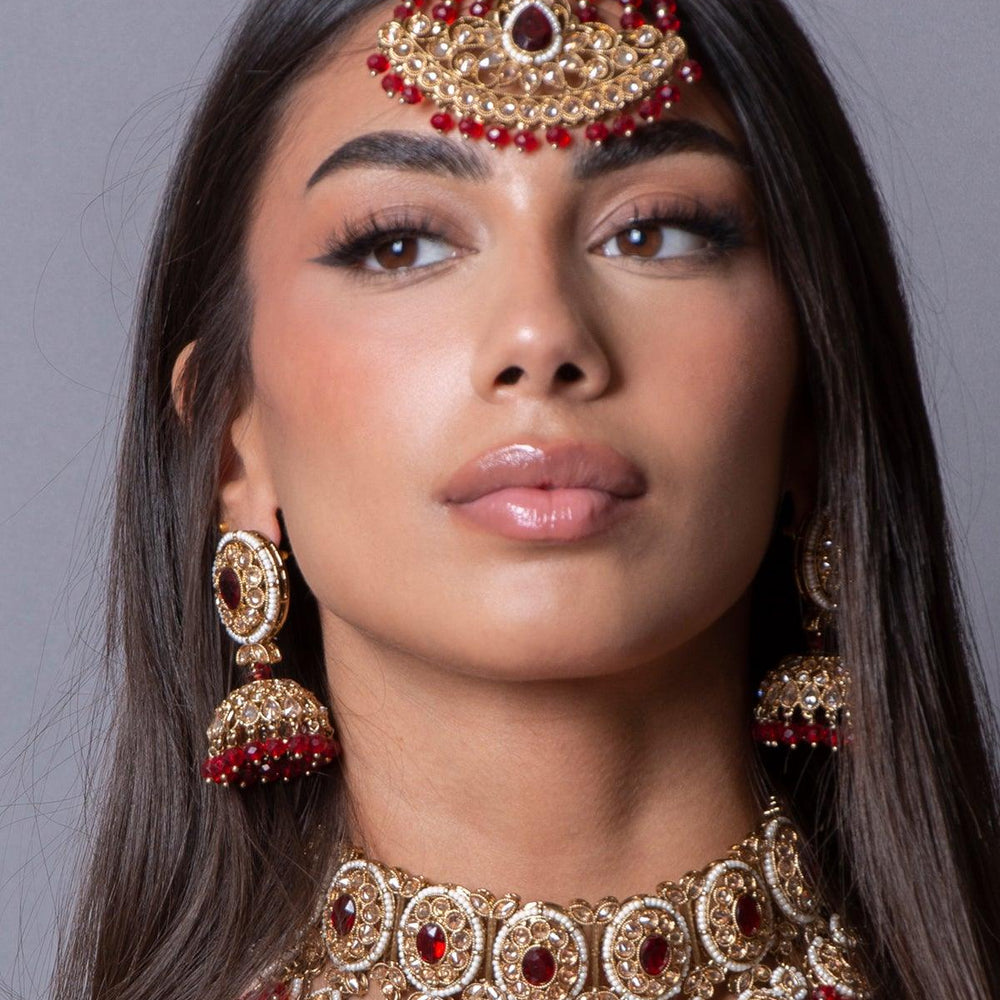 red maang tikka set with necklace