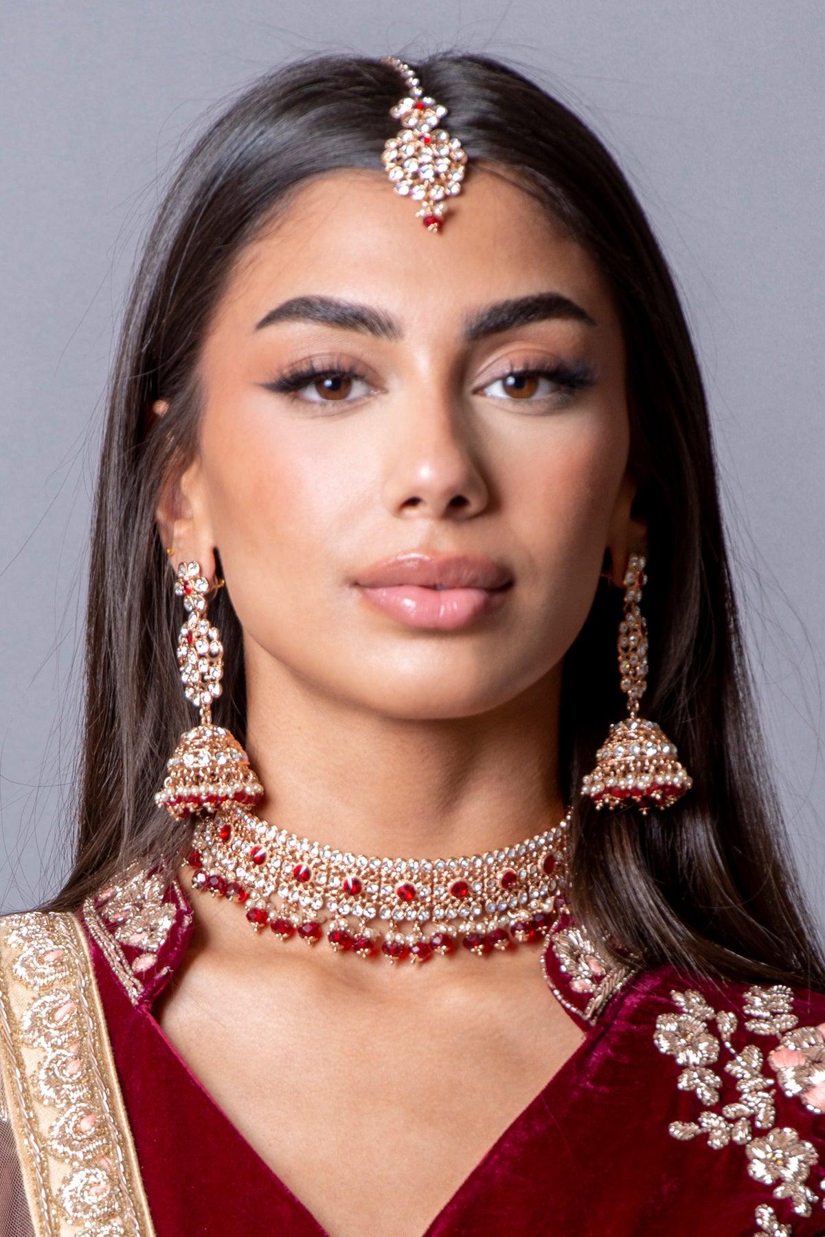 red and gold necklace with earrings