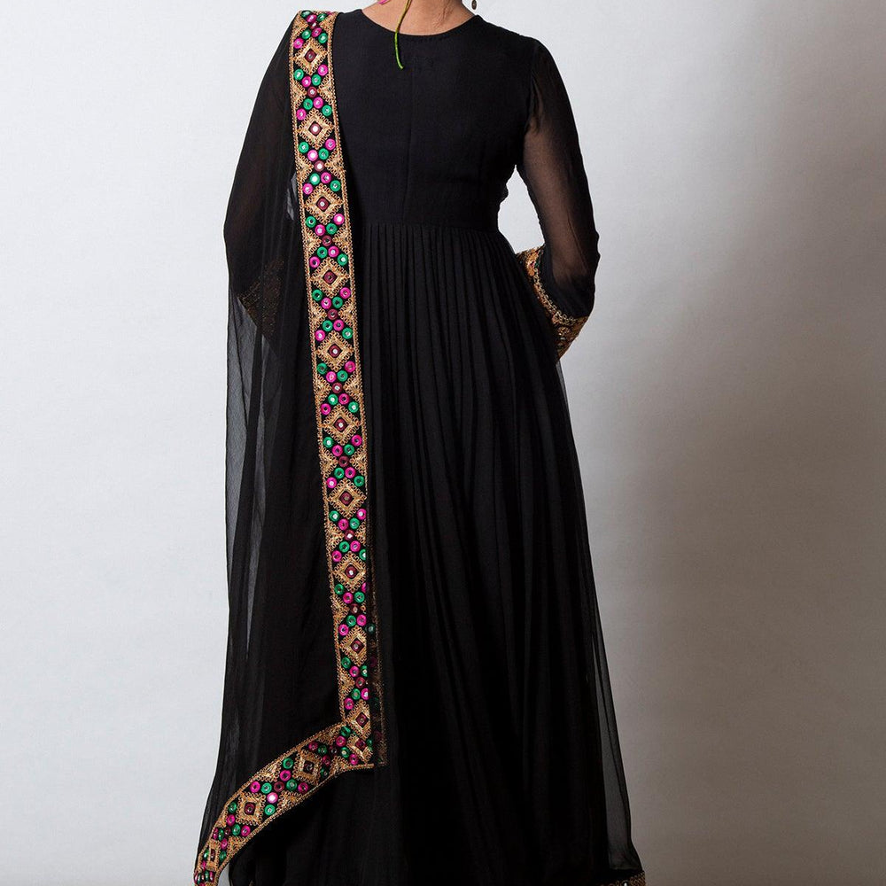 
                  
                    black afghan suit
                  
                
