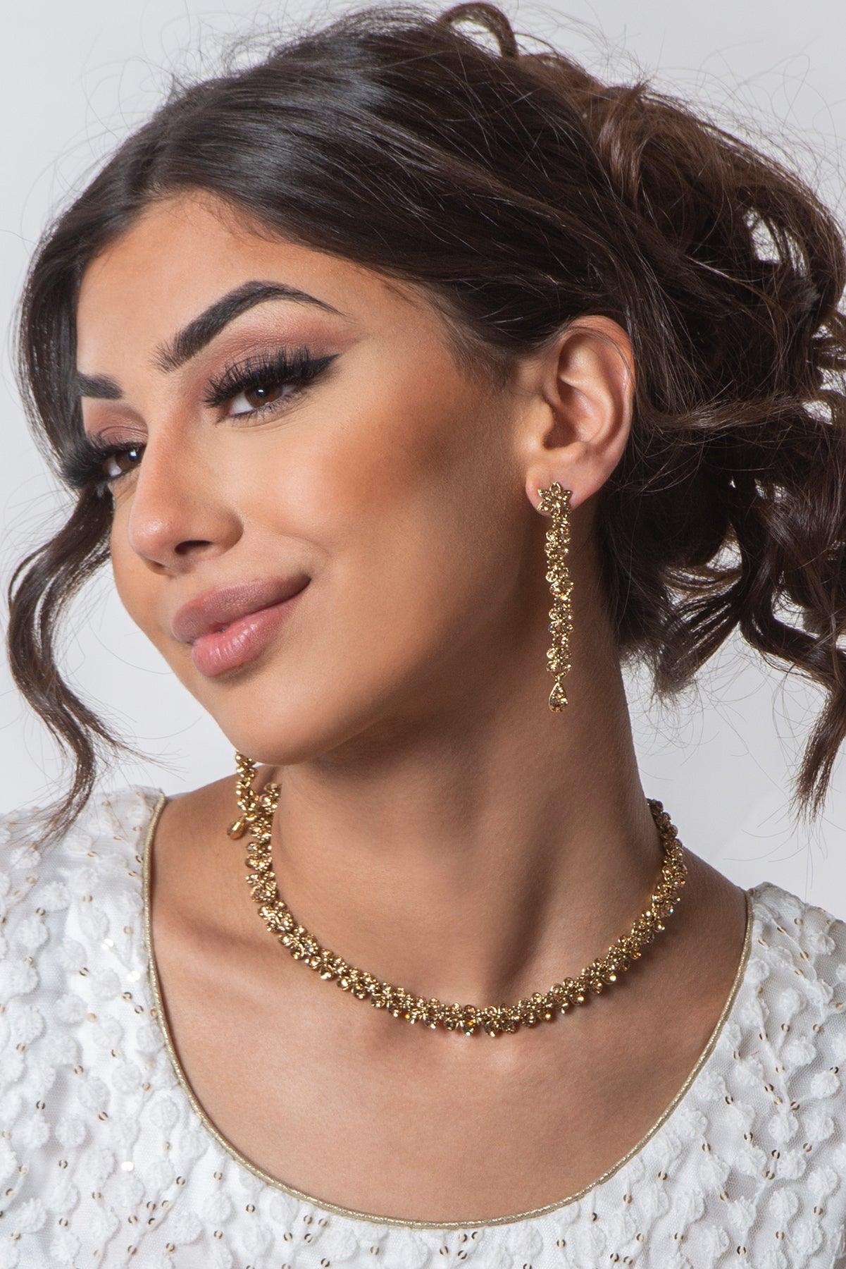 golden necklace and earring set