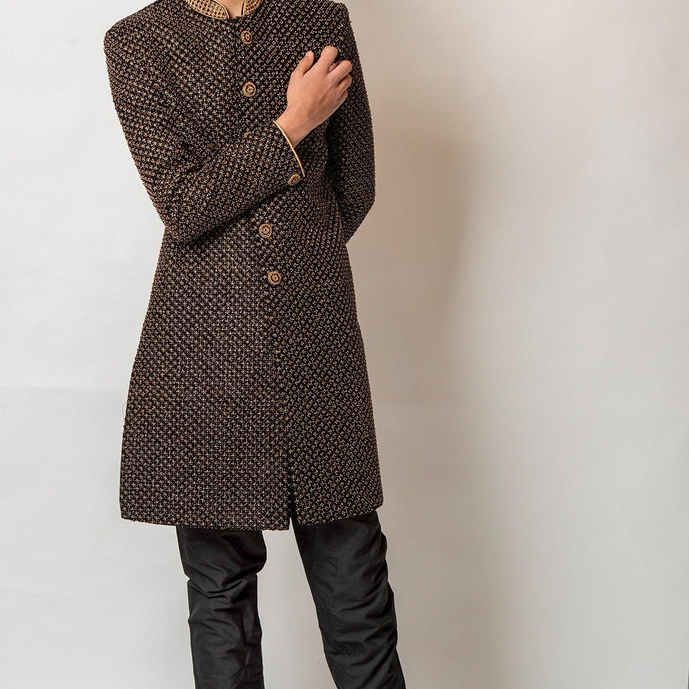golden bead embroidered on black sherwani
