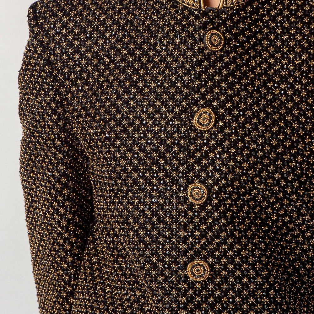 
                  
                    black sherwani with golden beads
                  
                