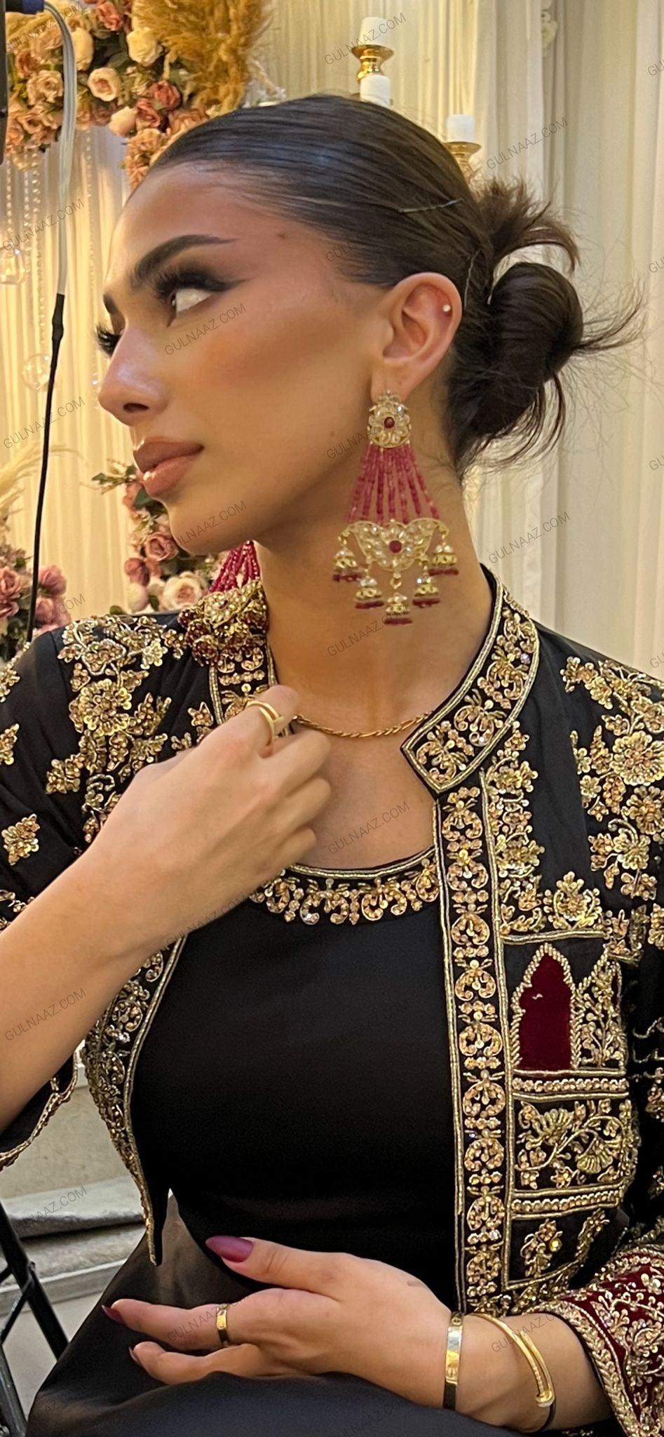 black gown with designer jacket