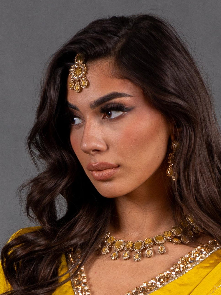 
                  
                    yellow necklace with maang tikka and earrings
                  
                