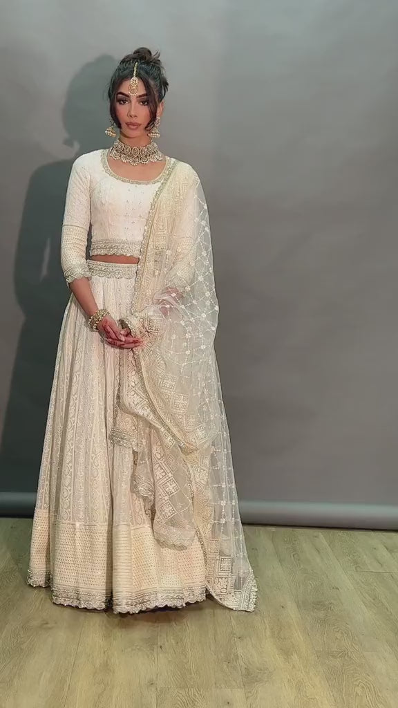 white lehenga with top